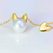Charm - 18K Gold and Premium Pearl Pendant Necklace